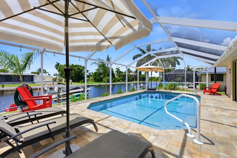Sparkling pool overlooking canal. Pool 26' x 14' x 6'D  (Boat lift not available)