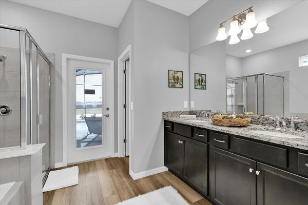 Master Suite 1, Shower and Tub, Downstairs, Door to Pool Deck