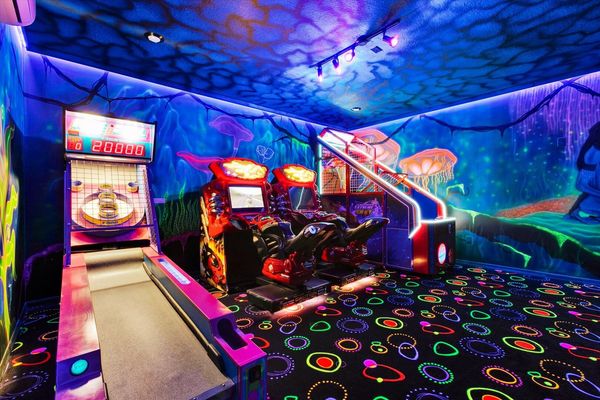 Game Room - Avatar, Downstairs: 
Has AC, Extreme Shot Arcade, Multi Video Arcade, 2 Nascar Racing Arcades, Skeeball