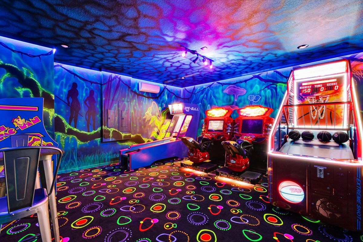 Game Room - Avatar, Downstairs: 
Has AC, Extreme Shot Arcade, Multi Video Arcade, 2 Nascar Racing Arcades, Skeeball