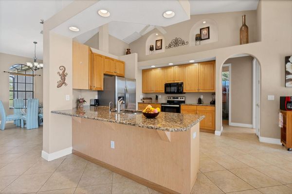 Bright, open kitchen overlooking living room