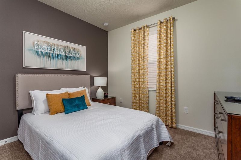 Queen Bedroom 5 Downstairs
Shared Bathroom-Shower
43" Smart TV