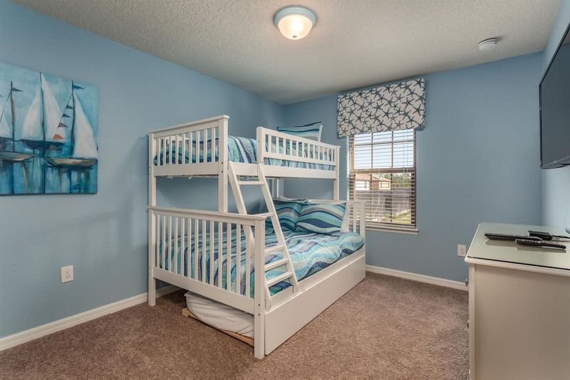 Twin/Double Bunk + Twin Trundle Bedroom 3 Upstairs
50" Smart TV