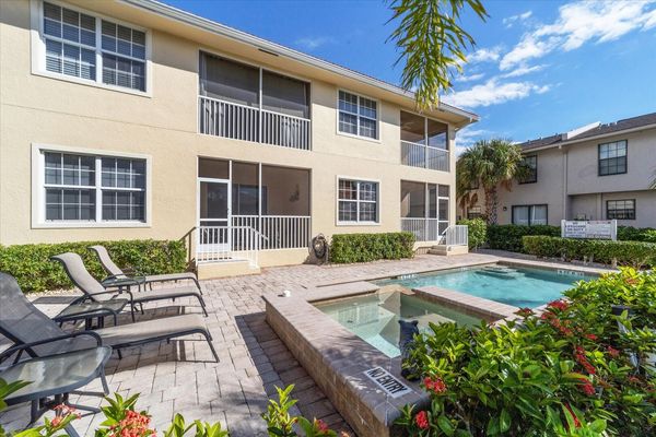 1st floor condo overlooking pool & canal