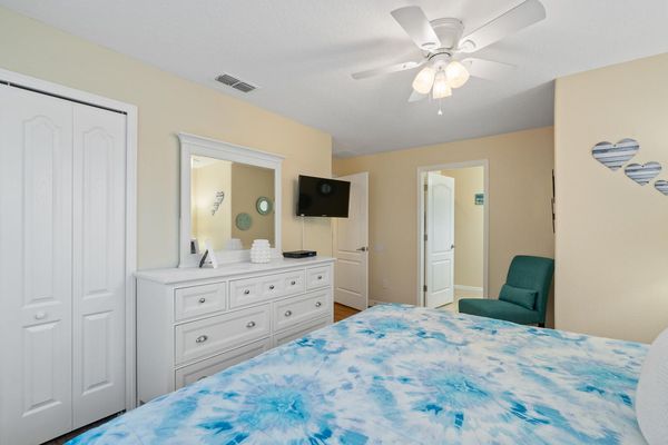 King Suite Bedroom 5 Upstairs Attached Bathroom 32" TV