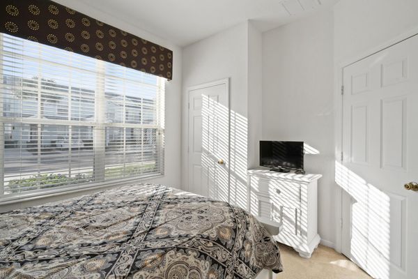 Queen Bedroom 3 (angle) 24" Smart TV