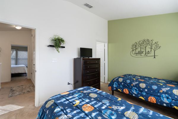 Two Twins Suite Bedroom 2 (angle) 24" TV