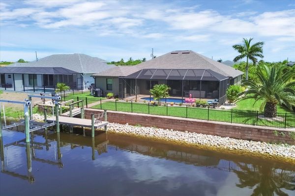Beautiful South Gulf Cove waterfront home with private pool (Boat lift not available)