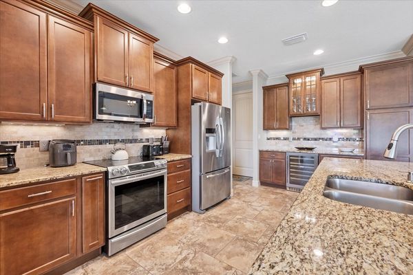 Bright, open, fully-equipped kitchen. Kitchen island seats 4