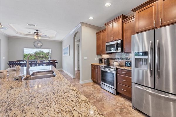 Bright, open, fully-equipped kitchen. Kitchen island seats 4