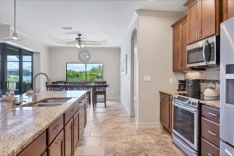 Bright, open, fully-equipped kitchen. Kitchen island seats 4