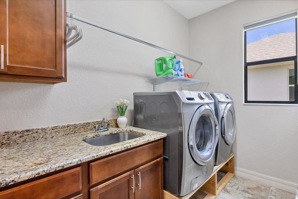 Laundry room with full-size washer & dryer