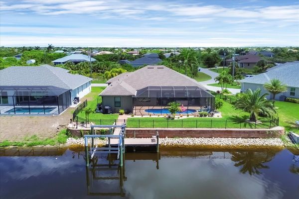Beautiful South Gulf Cove waterfront home with private pool (Boat lift not available)