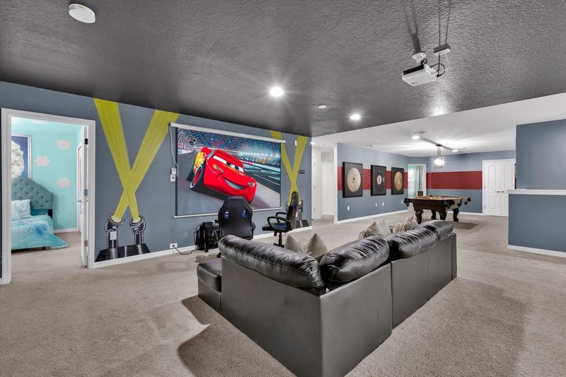 Theater Room in Loft
115" Projection Screen, XBOX