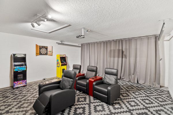 Theater Style Room w/ Projector and 80" Projection Screen
