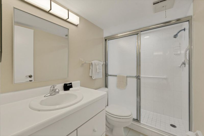The Bathroom Has A Walk-in Shower