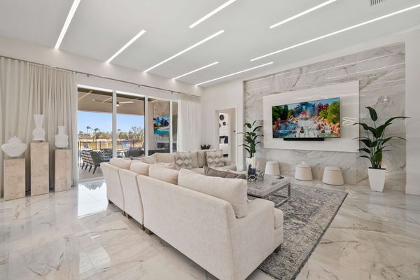 Gather in the spacious living room, designed with comfort in mind and ideal for entertaining guests or enjoying family time