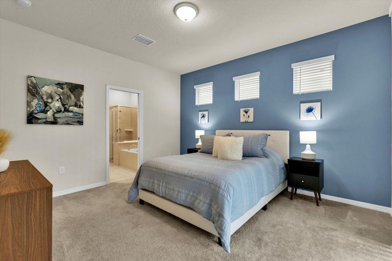 Master Queen Bedroom 1 Downstairs
Attached Bathroom