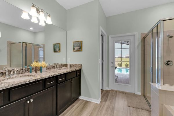 Master Suite 1, Shower and Tub, Downstairs, Door to Pool Deck