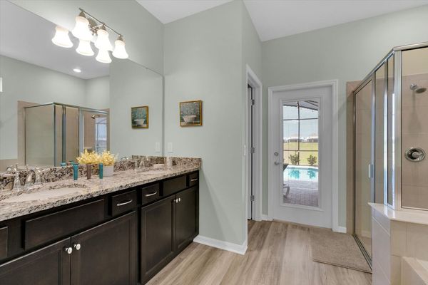 Master Suite 1, Shower and Tub, Downstairs, Door to Pool Deck