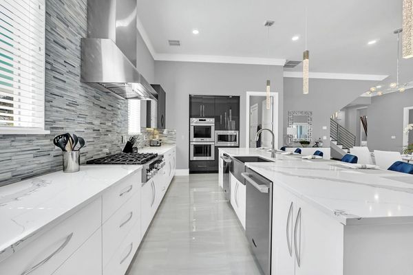 Our modern kitchen- equipped with a sleek 2-door fridge and oven, it's the perfect space to unleash your inner chef.