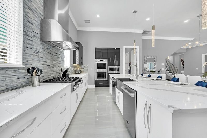Our modern kitchen- equipped with a sleek 2-door fridge and oven, it's the perfect space to unleash your inner chef.