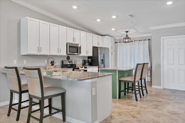 Bar stools provide 5 additional seats for dining