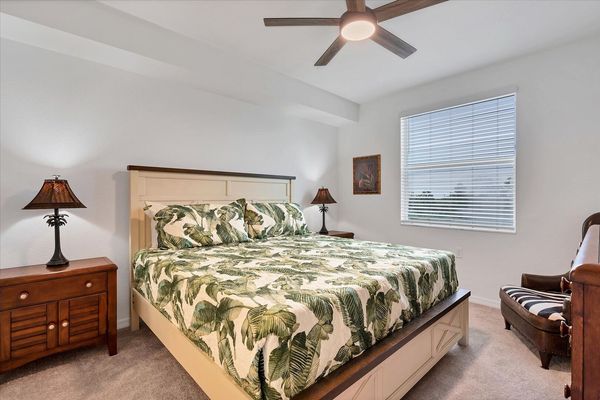 The Primary Bedroom Has A King Bed