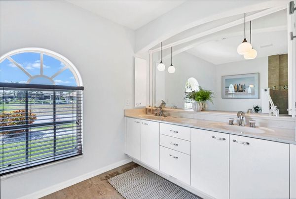 Ensuite features double vanities, walk-in shower and soaking tub