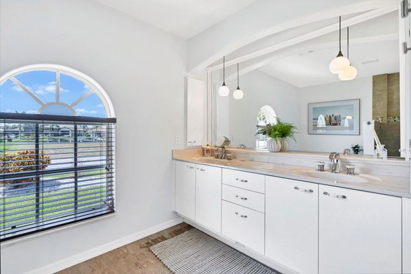 Ensuite features double vanities, walk-in shower and soaking tub