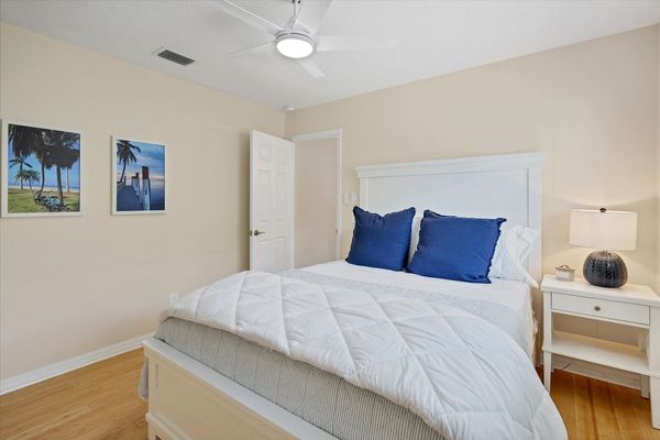 Guest bedroom with queen bed and 50-inch Smart TV