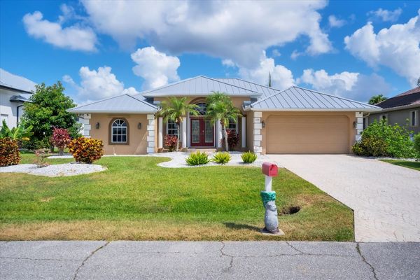 Beautiful Punta Gorda Isles canal home with private pool