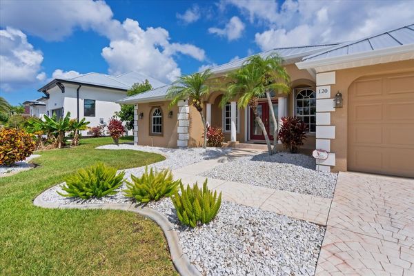 Beautiful Punta Gorda Isles canal home with private pool