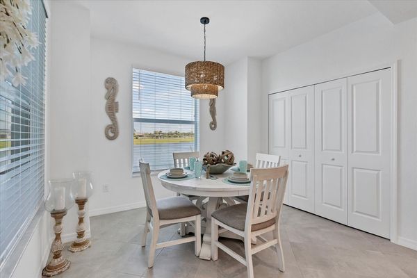 Dining table overlooking pond. Table seats 4