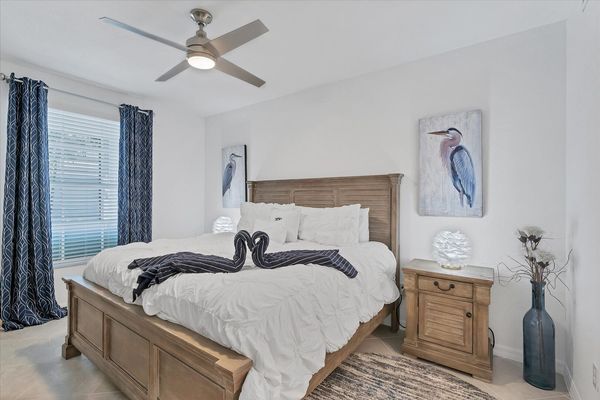 Primary bedroom with 55" Smart TV & ensuite