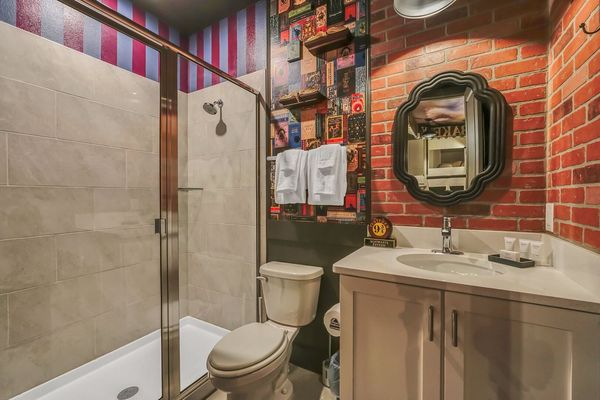 Ensuite bath with design-coordinated fixtures and finishes that enhance the overall aesthetic