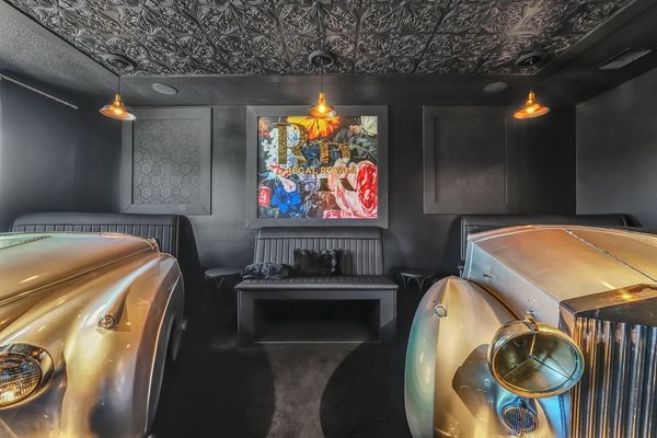 Elegant automotive-inspired decor and ambient lighting complete the atmosphere, offering a blend of sophistication and relaxation for enjoying your favorite films