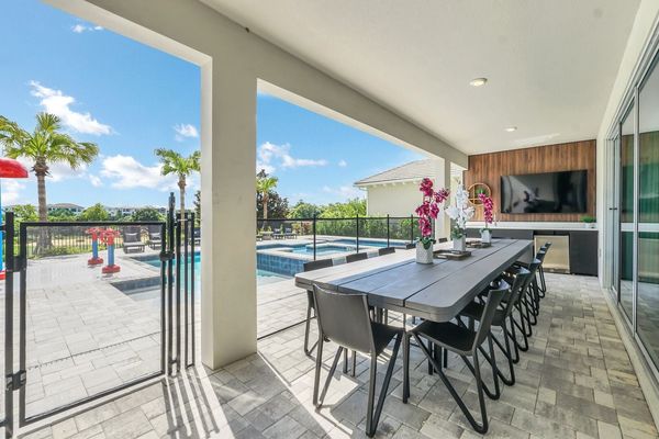 Dine al fresco under the covered lanai with seating for 12