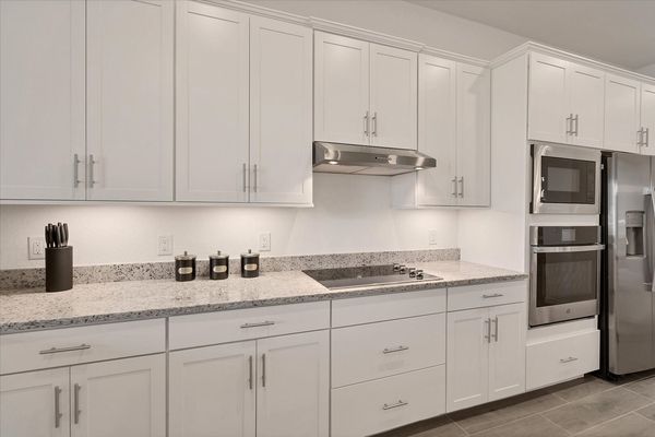 Gorgeous, fully-equipped kitchen with all new stainless steel appliances and large kitchen island that seats 4