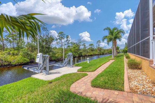 Path leading to boat dock. (Boat lift is not for guest use). Dock size is 14' x 6'. Dock also fish lights (Boat lift not available)