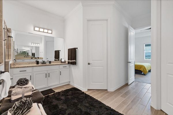 Beautiful, spacious en suite featuring walk-in shower and double vanities