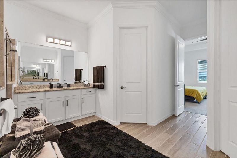 Beautiful, spacious en suite featuring walk-in shower and double vanities