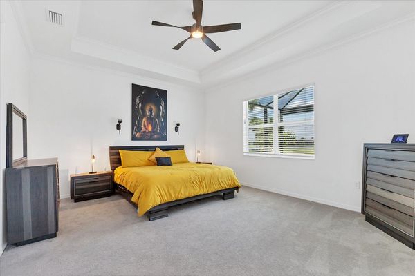 Primary bedroom with king bed and en suite