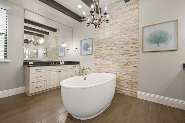 The en-suite bathroom has a walk-in shower