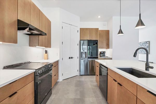 Beautiful, fully-equipped kitchen with brand new appliances. Kitchen island seats 4