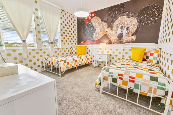 Two Twins Bedroom 5, Upstairs
Shared Bathroom
Mickey Theme