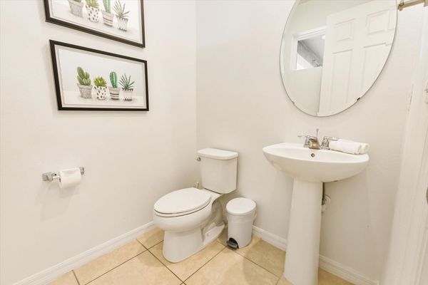Half Bathroom 5, Downstairs
Off Kitchen by the Pool