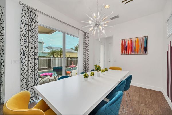 Dine in style at the formal dining table, which comfortably seats 8 guests for any occasion