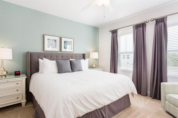 Experience true relaxation in this opulent King bed, which promises a serene escape with its plush and cozy design