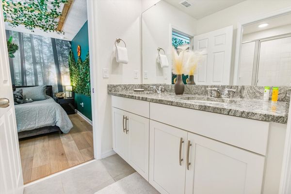 Shared Bathroom 4, Upstairs
Shower